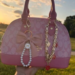 Coach Pink Bow Handbag with Pearl and Charm Accents